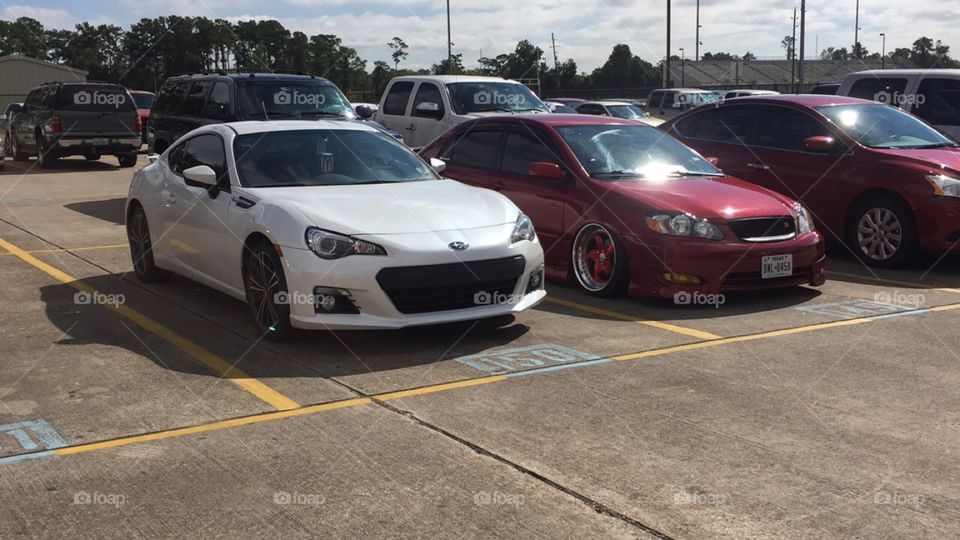 At my school parking lot me and my friends car