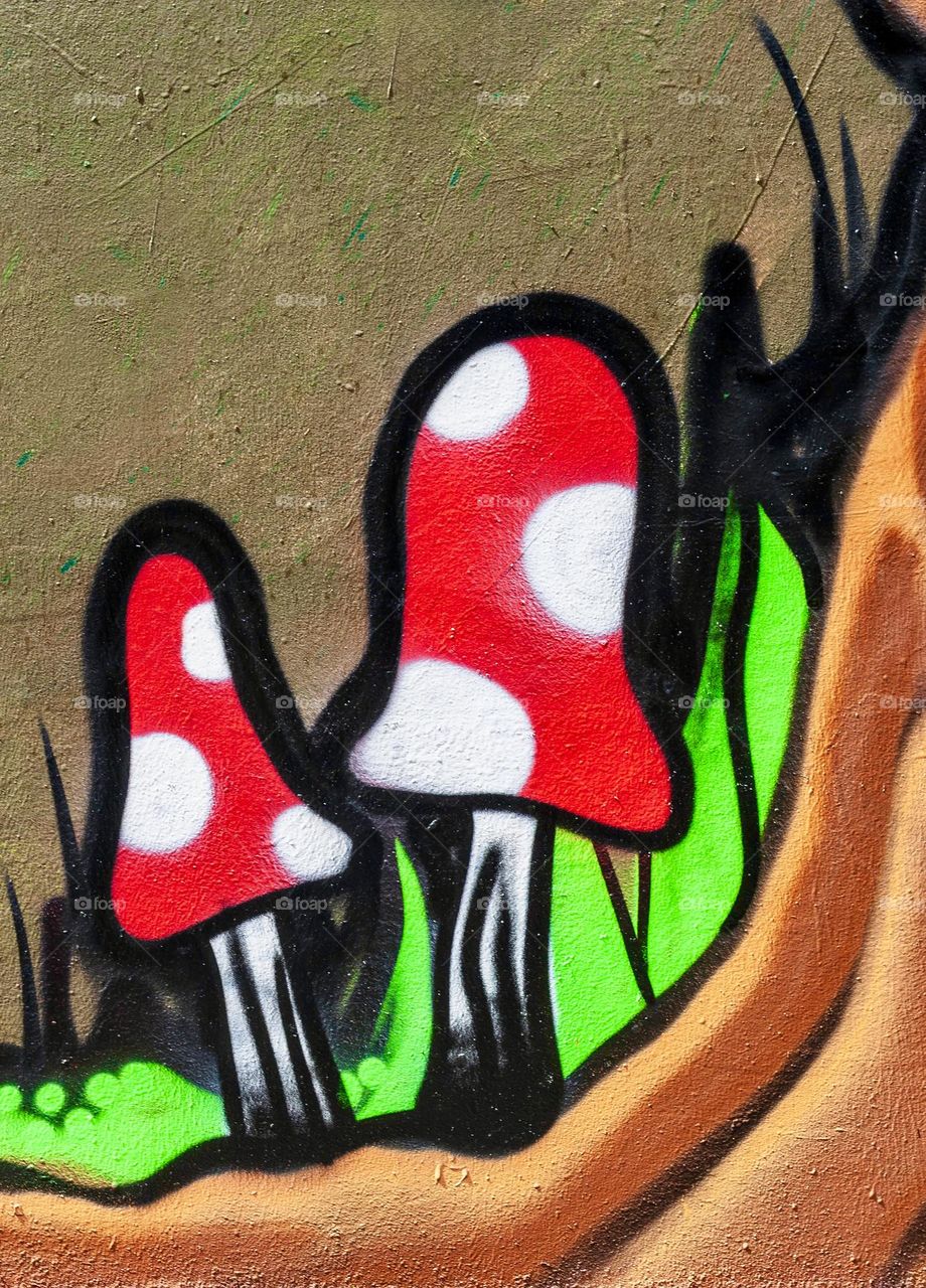 Bright red graffiti mushrooms