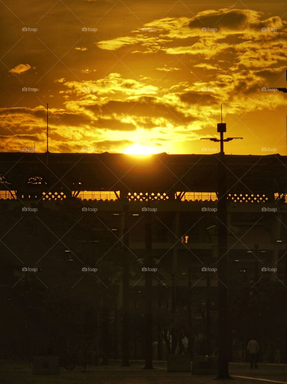 sunset at city and stadium