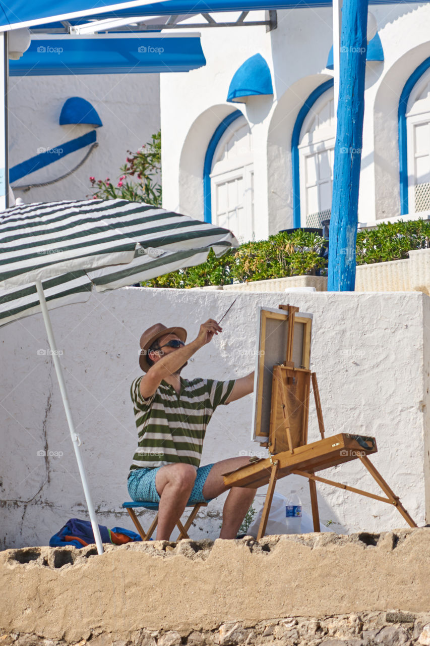 Painting by the seaside