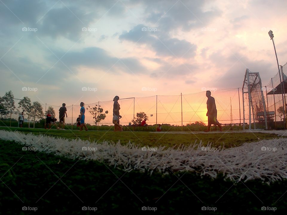 look the sunset while playing see the sunset while  futsal