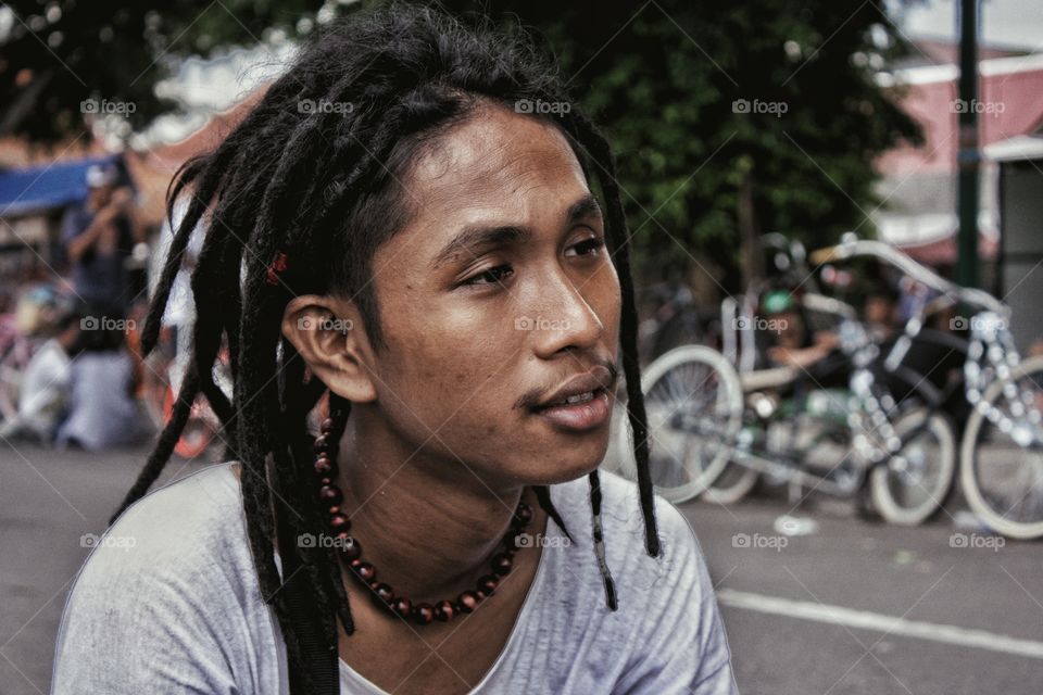 Man with his dreadlocks hair in Jogjakarta Indonesia