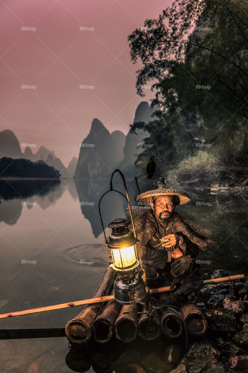 Cormorant fisherman fishing in Li river