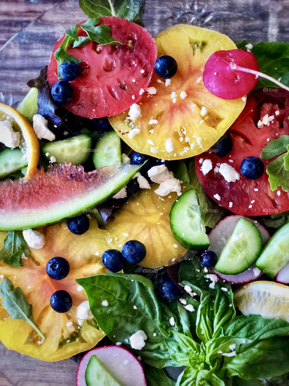 Healthy, Colorful and Vibrant Organic Food! Salad with Heirloom Tomatoes, Watermelon; Blueberries; Persian Cucumbers, Fresh Basil, Radishes; Feta Cheese. Foap Mission, Let’s Eat!