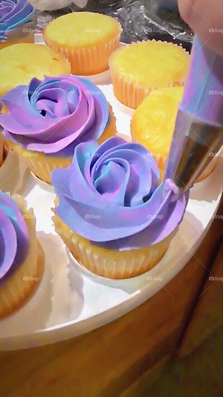 Frosting a Purple Cupcake