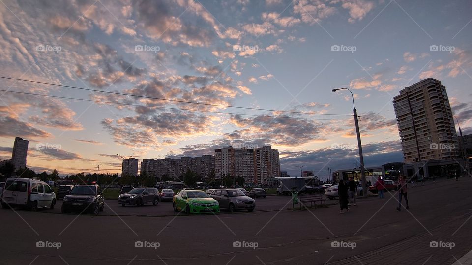 City bustle and beautiful and extraordinary sky. Live photo.