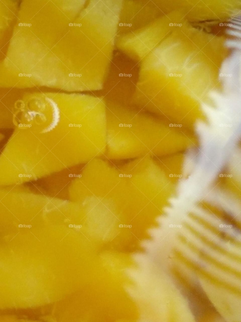 A reflection of light creating shapes💢 on the peach water💦.