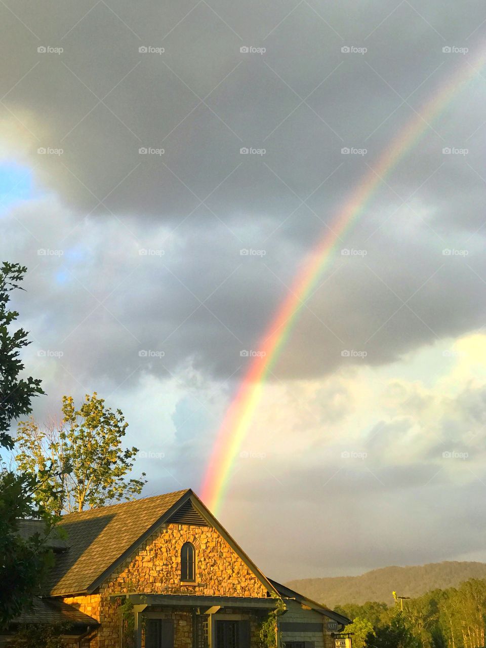 Rainbow over cottage