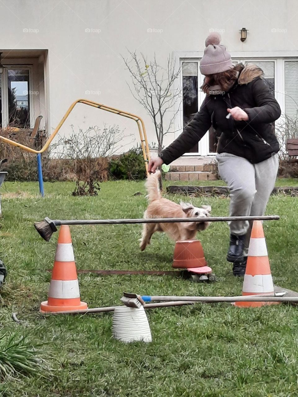 girl training her dog