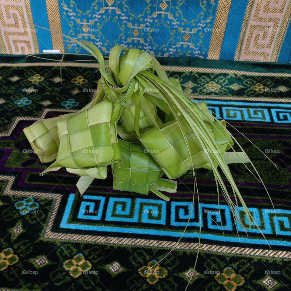 This is called a ketupat where food is often made during the month of Ramadan and holidays