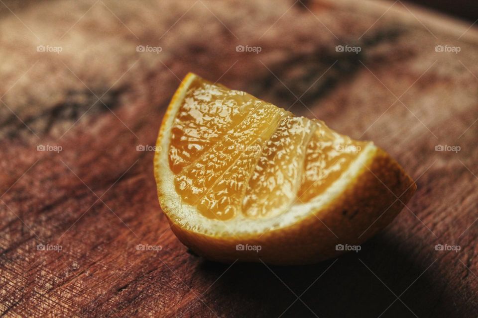 fresh cut lemon on a board