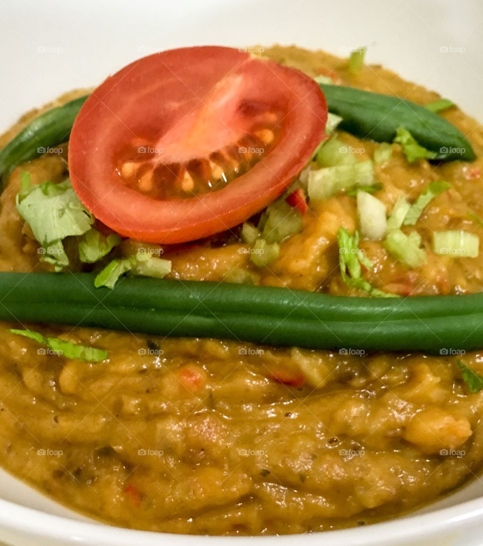 Pumpkin squash, lentil and vegetable soup homemade closeup healthy eating 