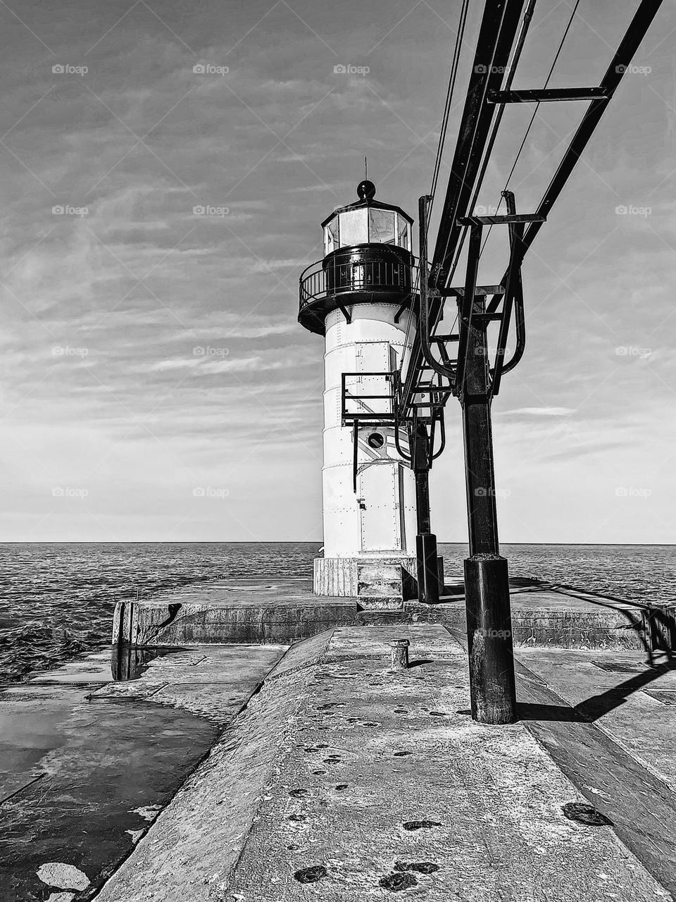 Lonely black and white lighthouse, sadness portrayed in a building, lighthouse of sadness, monochrome light house, Michigan lighthouse 