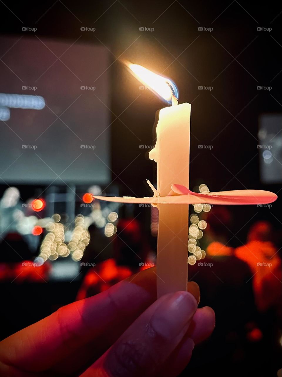 A white stick candle aglow!