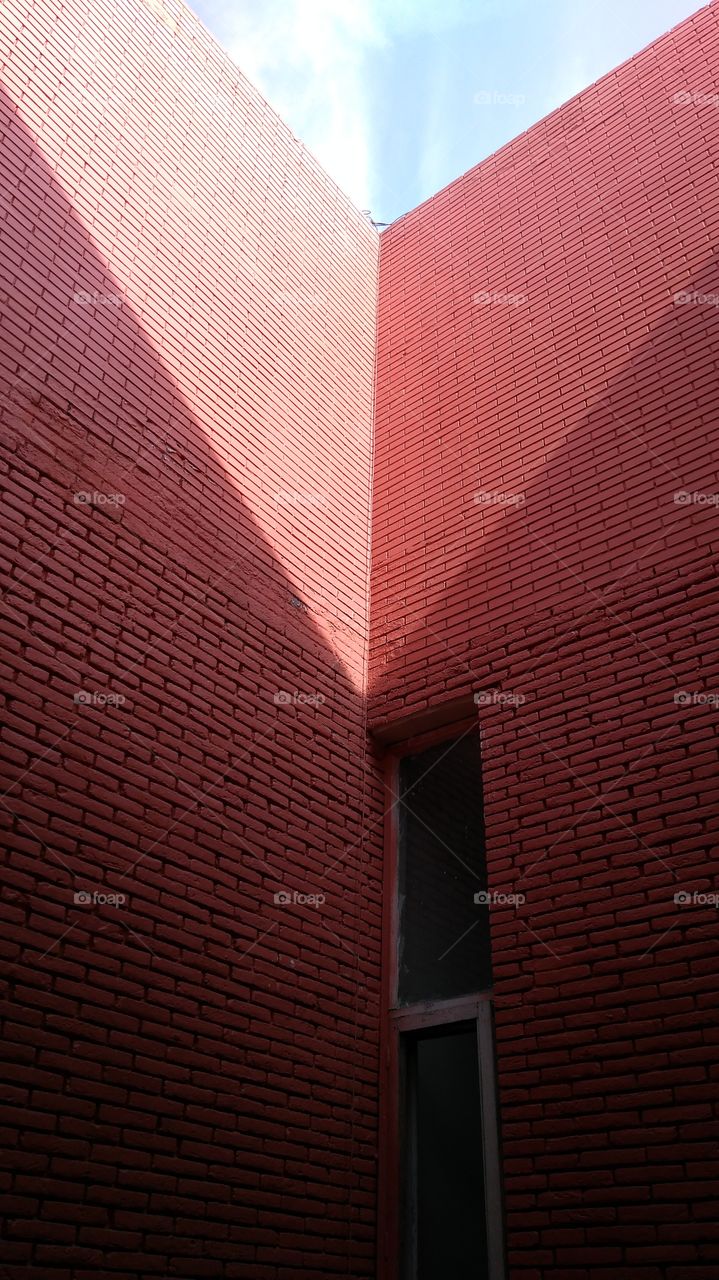 shadow photography in red building