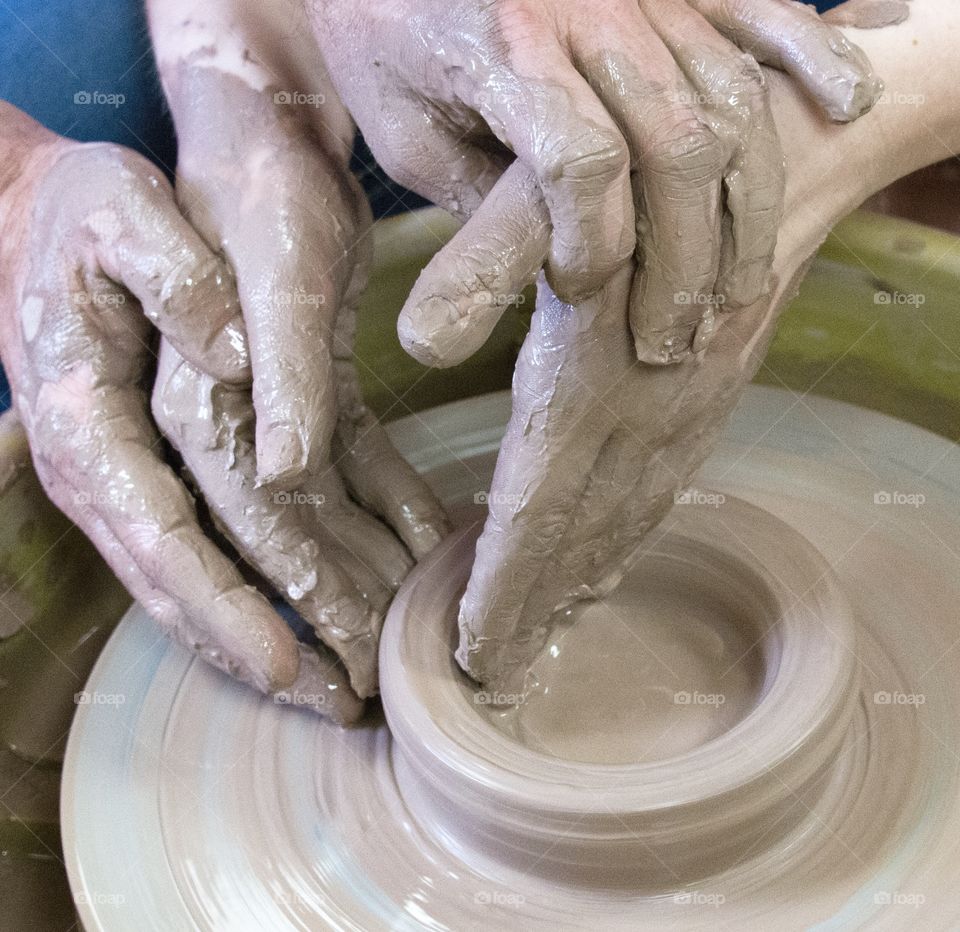 Ellipses and Shapes, making pottery on a pottery wheel