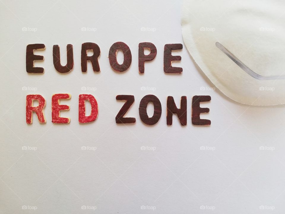 Written :"europe Red zone" and medical mask