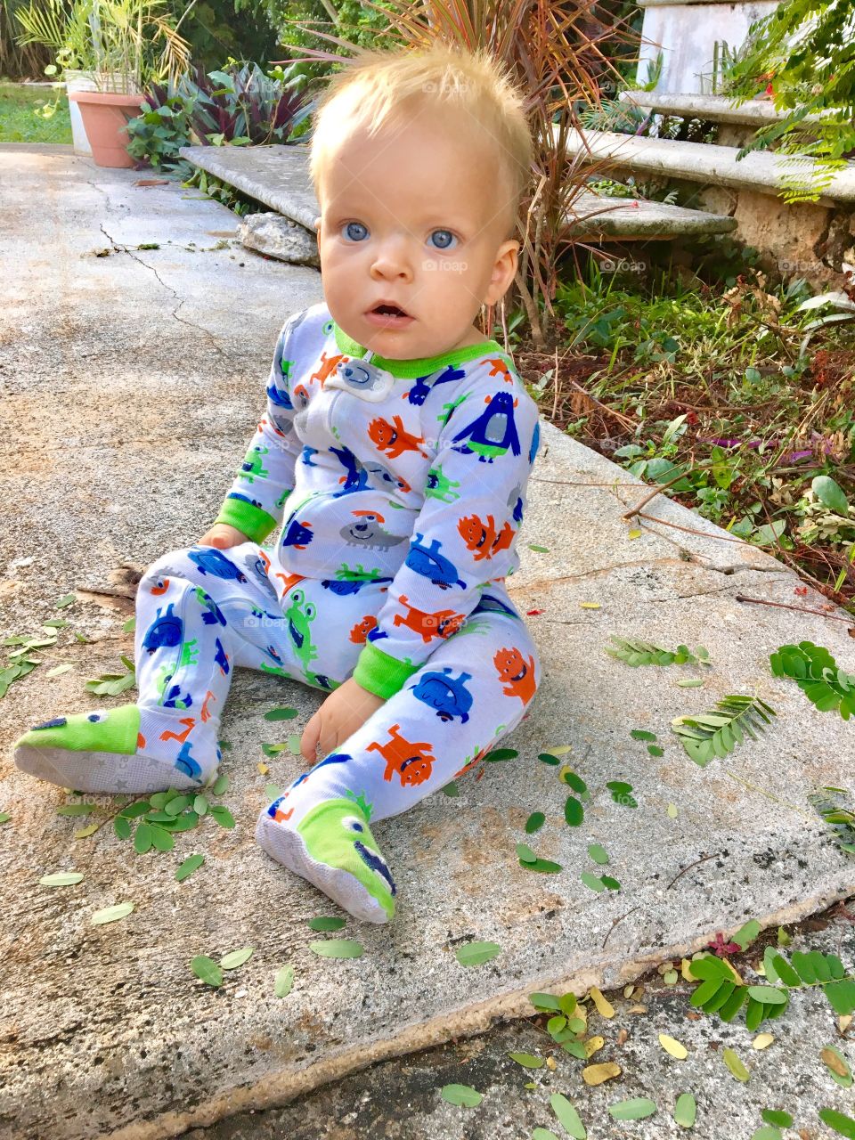 Baby boy watching the sun rise 
