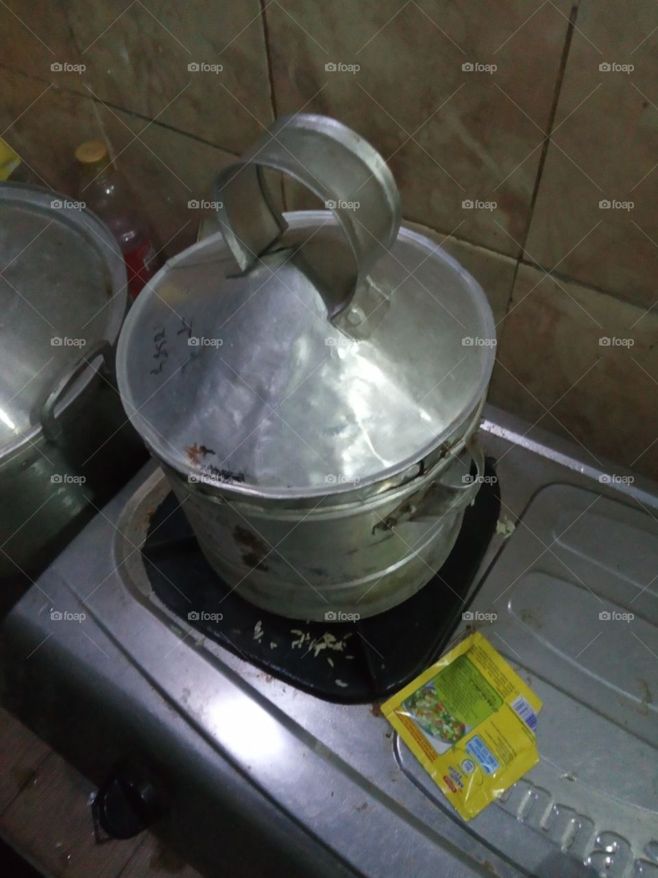 atanak nasek (cooking rice)