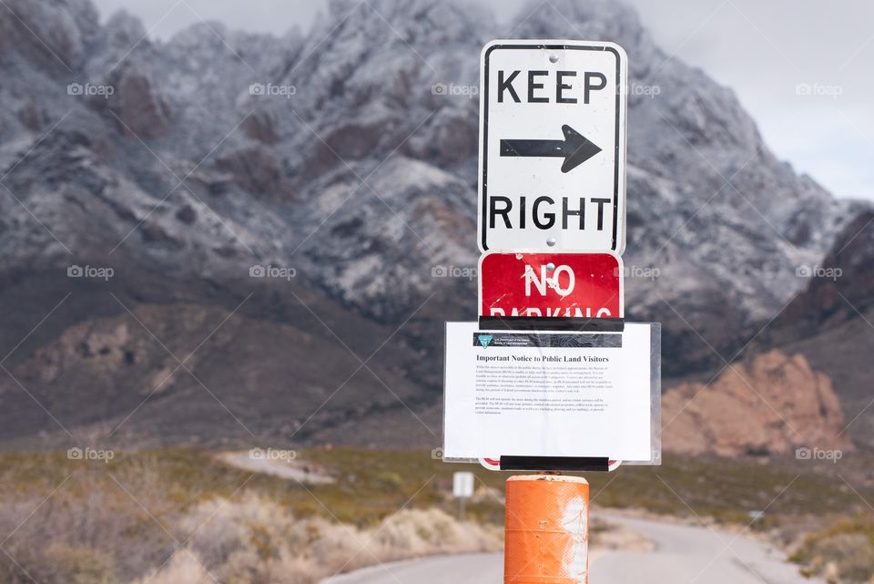 A keep right sign at the gate of the park because of government shutdown