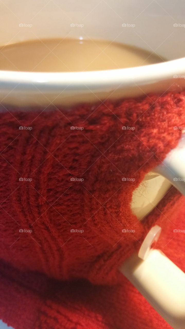 Keeping the coffee warm with my cup cozie