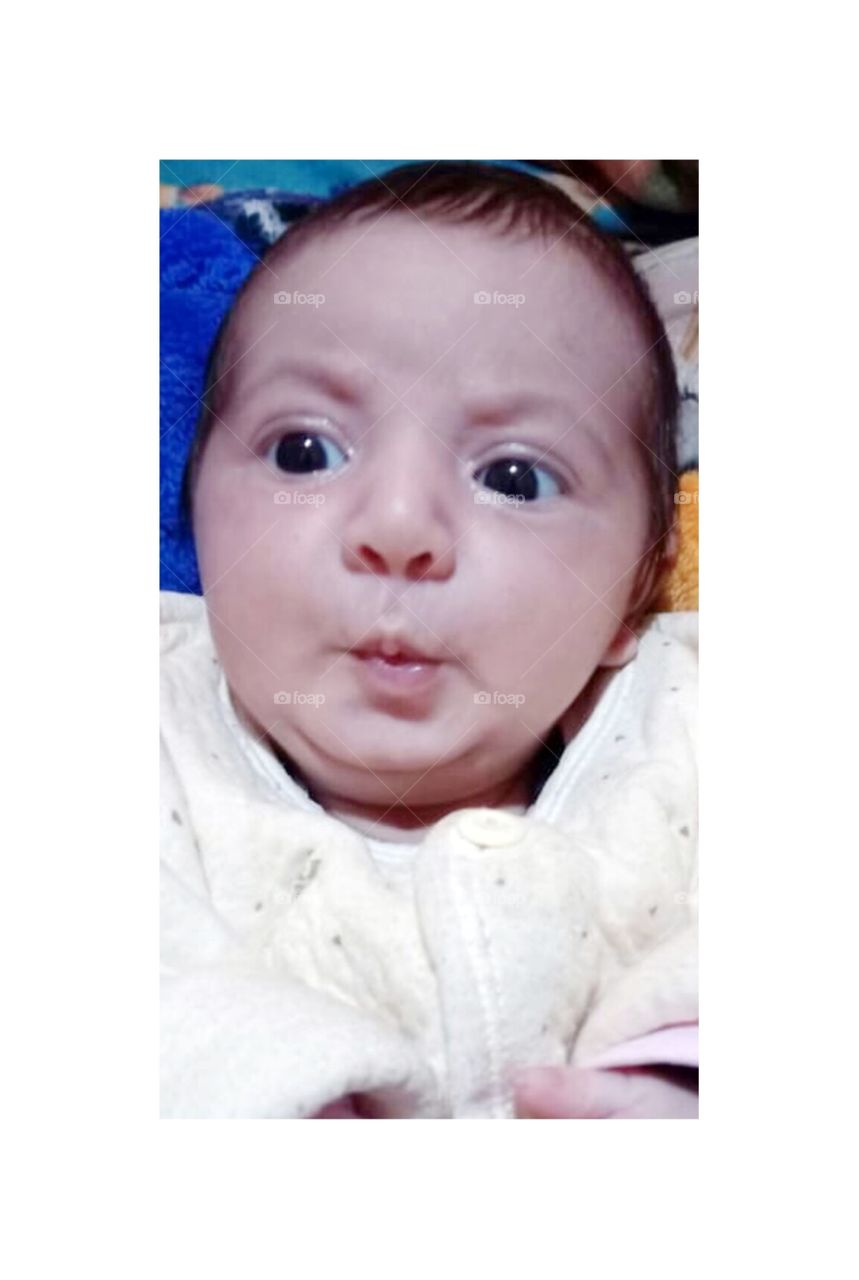 Friend’s baby making faces 