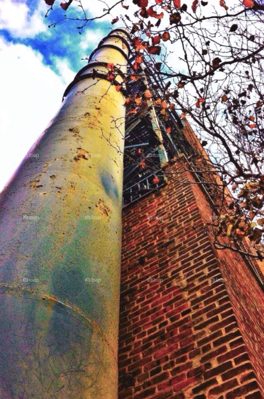 Rusted pipe and brick . Newark, New Jersey 