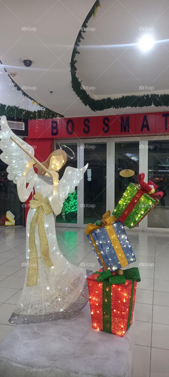 Warming up for Christmas.  Angels dancing and bringing gifts for the festive season.