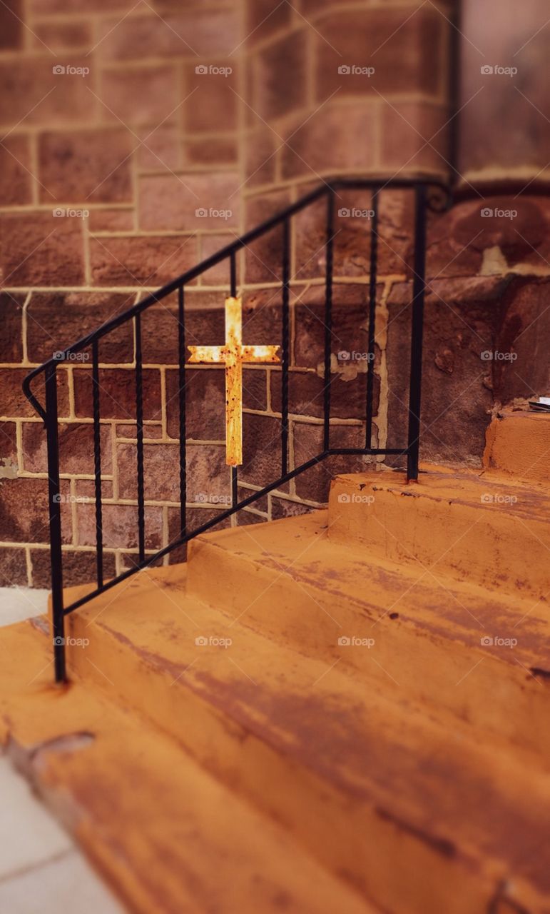 Cross On The Steps Of A Church In Philadelphia Pennsylvania, Rusted And Weathered