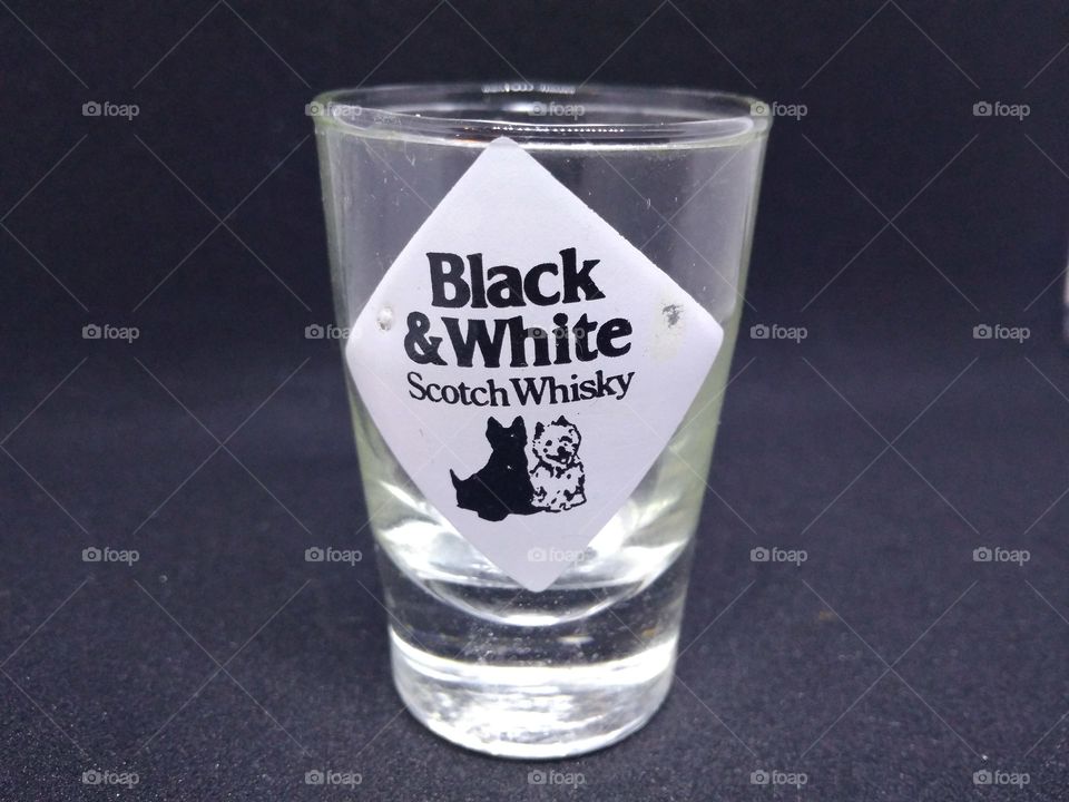 Black and white Scotch Whisky glass shot