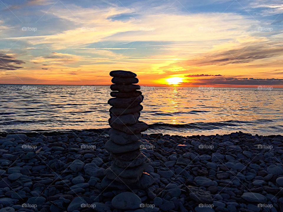 Piling up stones and the beautifully sunset! 