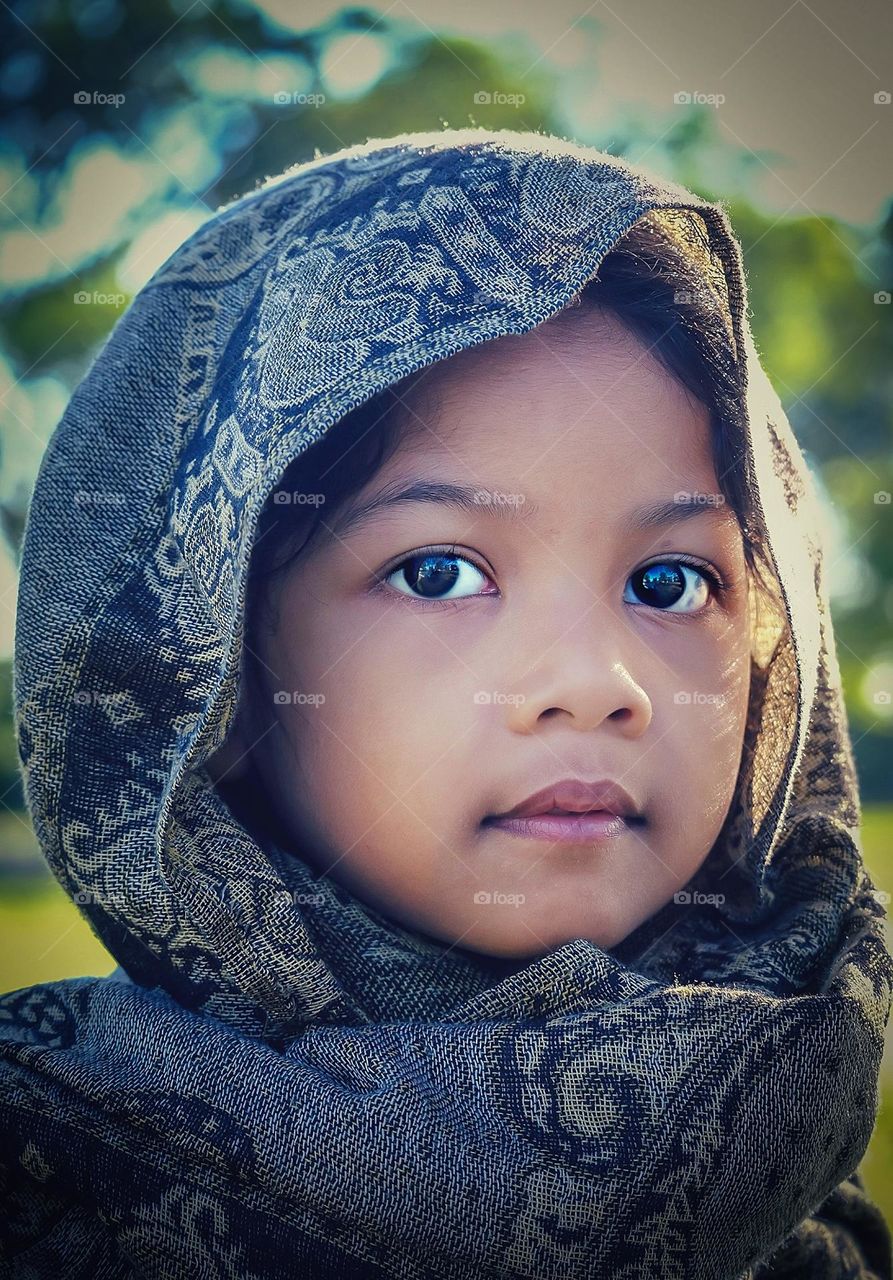 closed up of a little girls wearing hijab