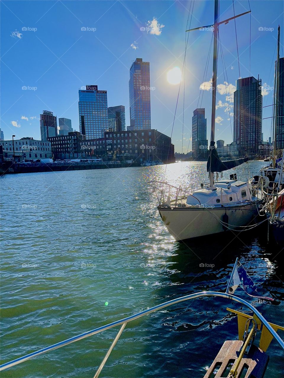 This is “Newtown Creek” by the “Pulaski Bridge” in LIC, Queens seen from the front deck of “Salvation”, the “28 ft 1969 Luhrs” cabin cruiser that is home to myself and my partner “Timothy Trespas”. 2024. Hypnotic Productions