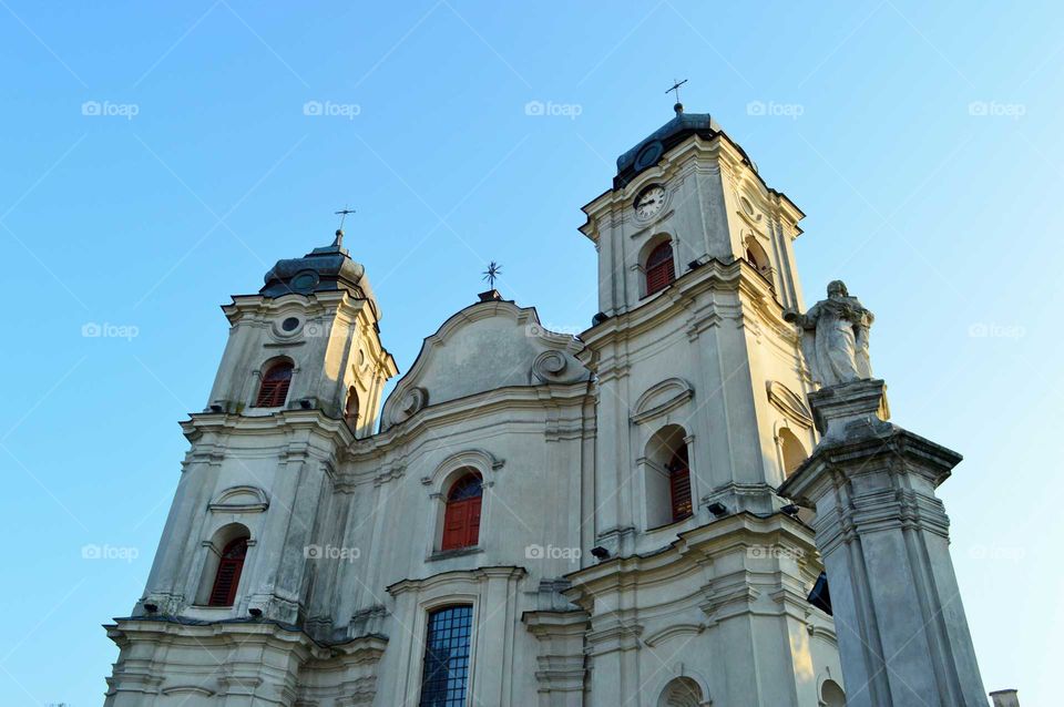 Clear blue sky above the historic church in Poland