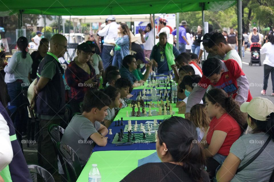 People playing chessboard 