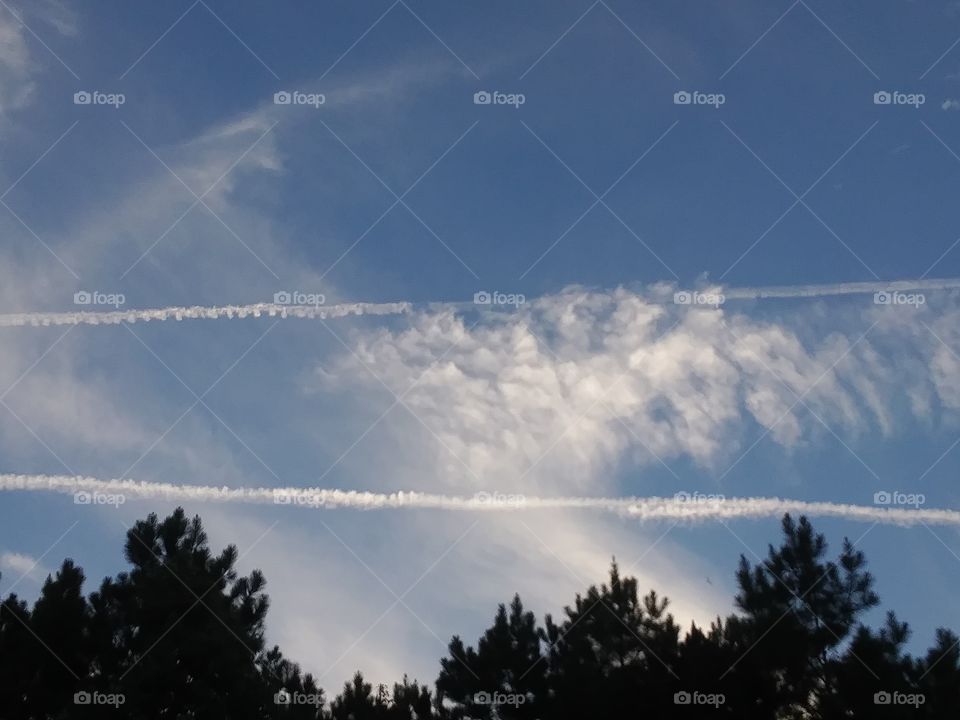 clouds & a plane trail