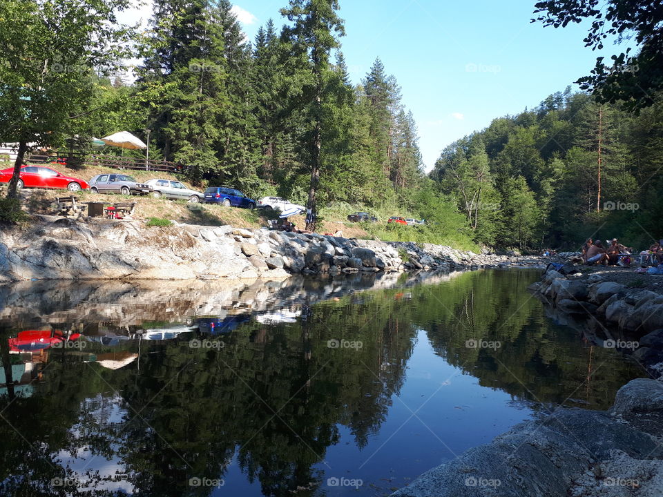 rest and recreation in nature on the river and waterfall Kamenica