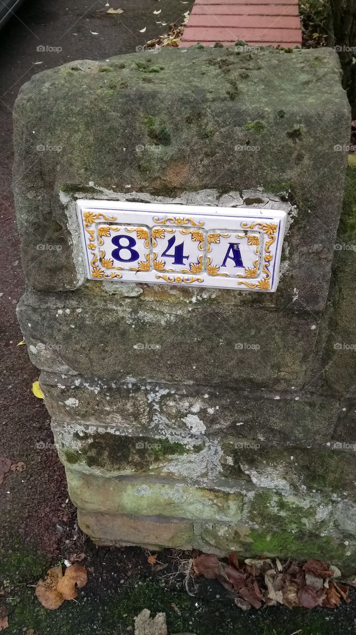Number in stone wall