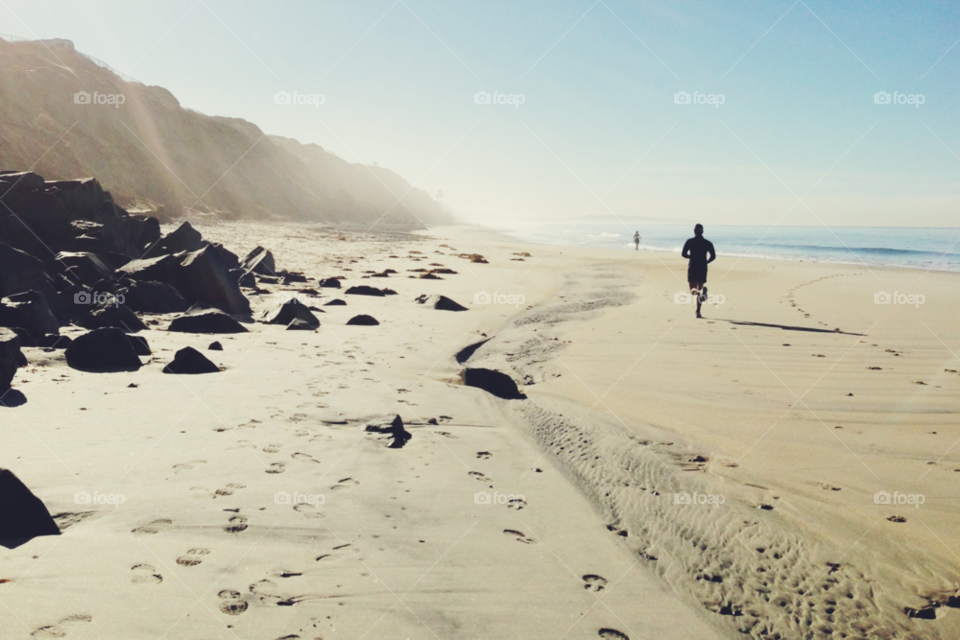 People exercising on beach