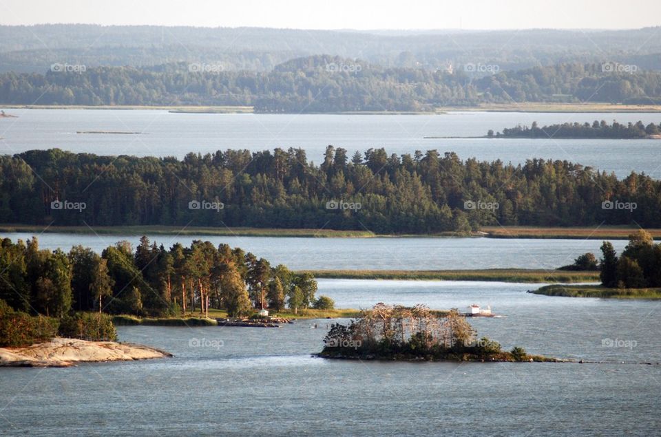 The white house near the lake at distance