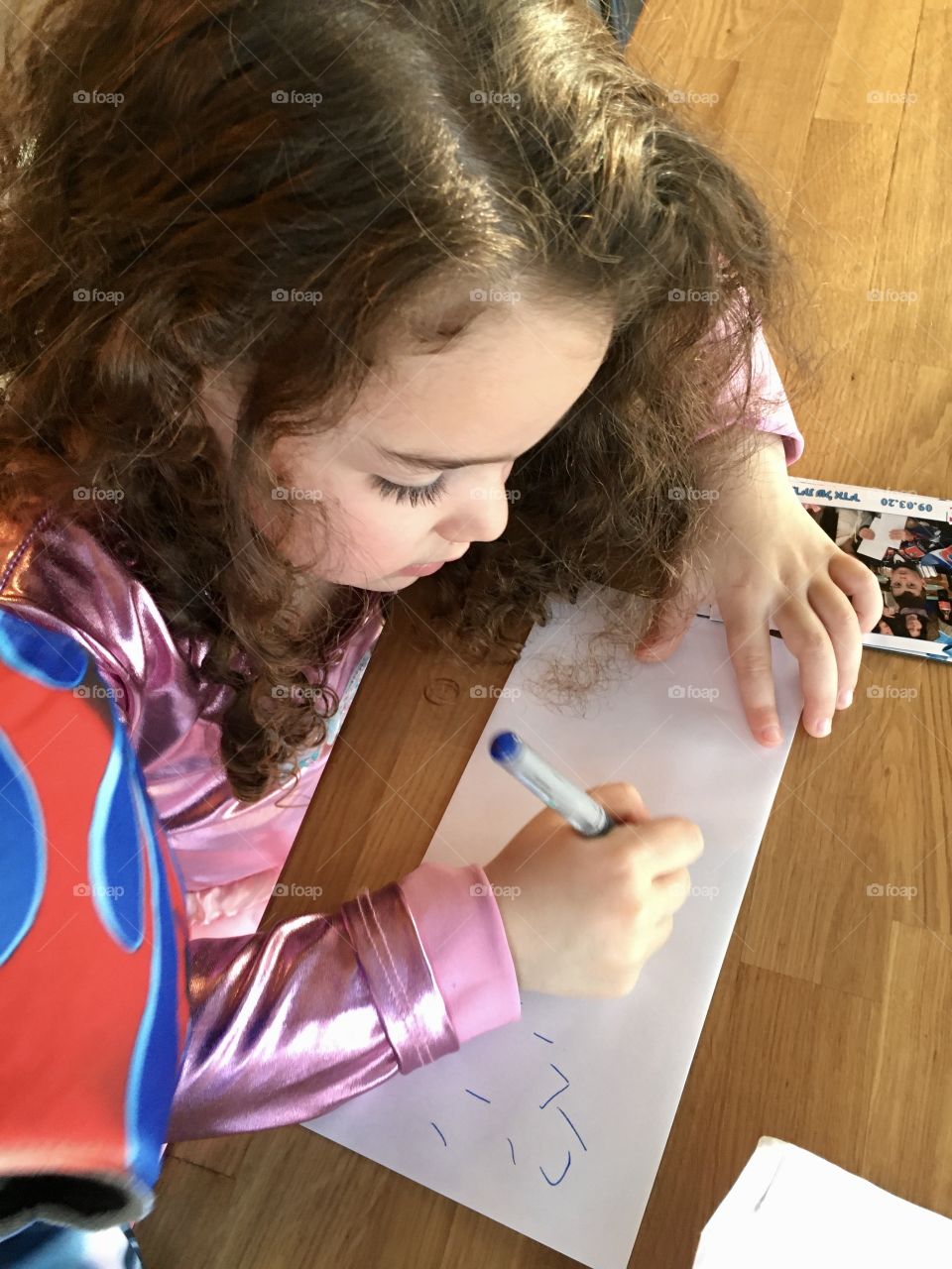 Children write checks