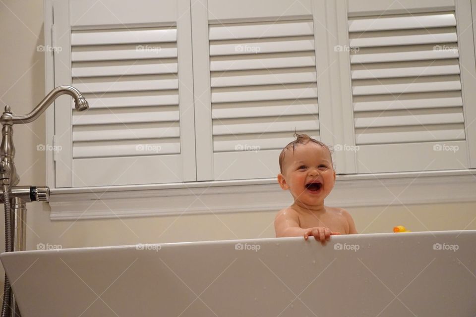 Baby in a bath tub. Tubby time
