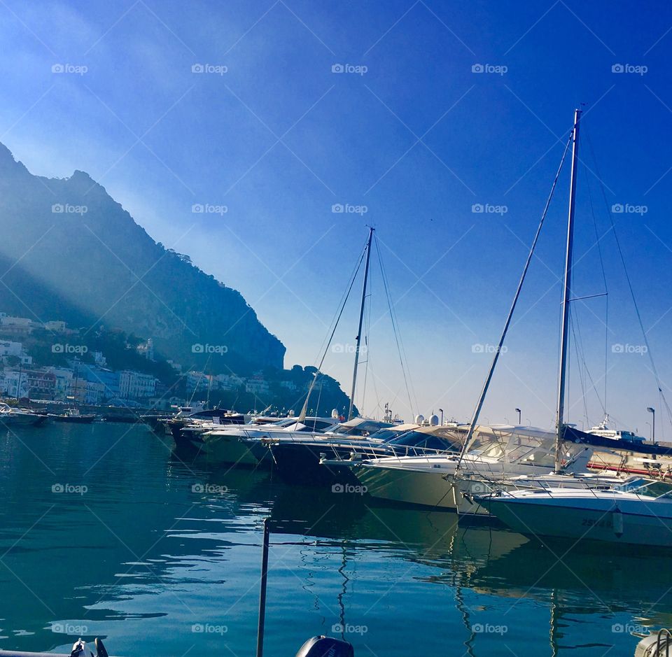 Sleeping yachts. One day at Capri island 