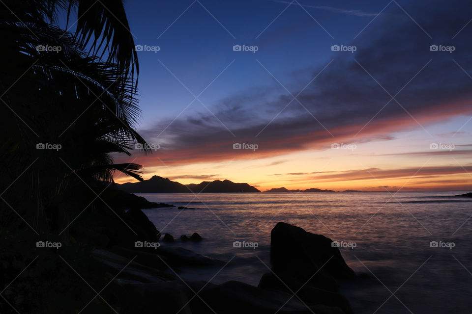 Sunset behind praslin island