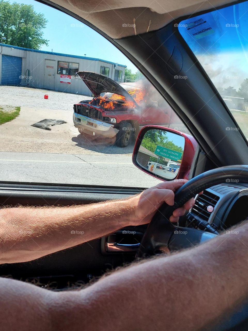 truck on fire! glad no one's hurt and glad it's not my truck. the fire department is here.