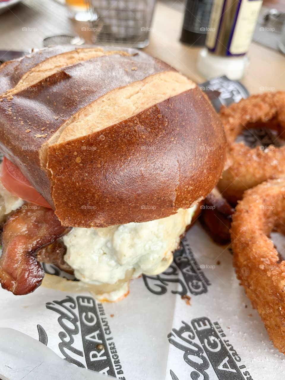 Hamburger with blue cheese bacon and onion rings