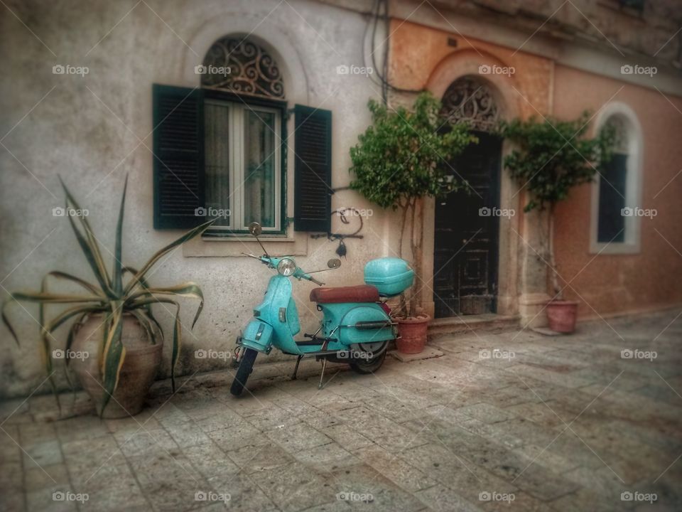 Tuscany, Italy. Motorcycle in beautiful Corfu Town