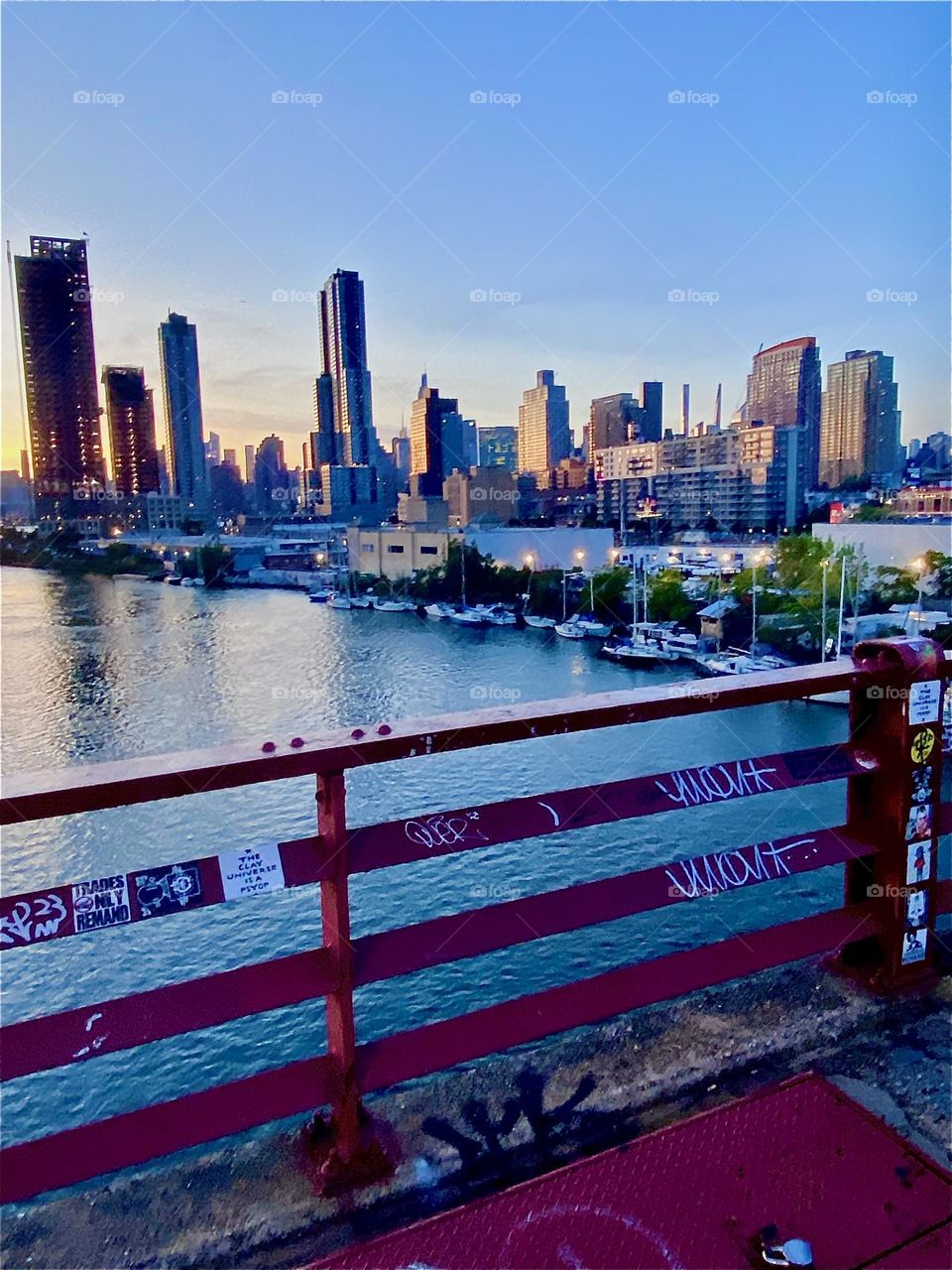 This is the view of LIC and “Manhattan” from the “Pulaski Bridge” at “Newtown Creek” about halfway across the bridge on a warm sunny Indian summer evening in early October 2023. Hypnotic Productions