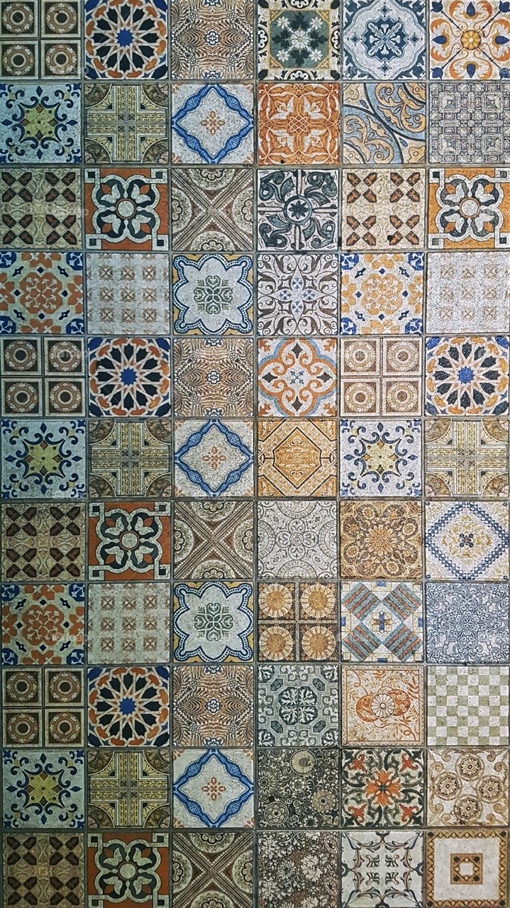 seamless pattern of square floor tiles. Full frame top down view