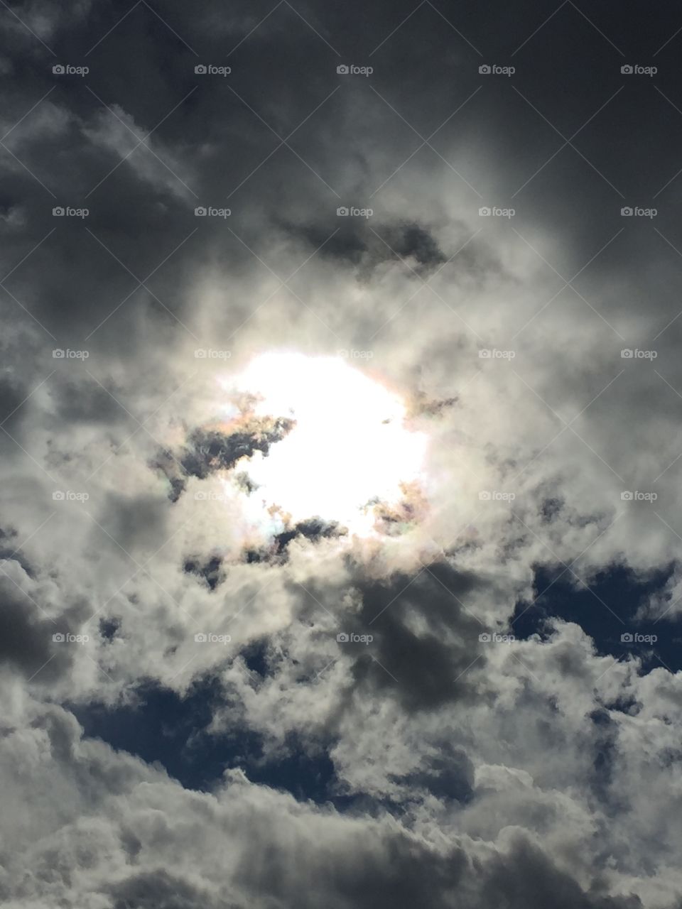 sun peeking through the clouds 